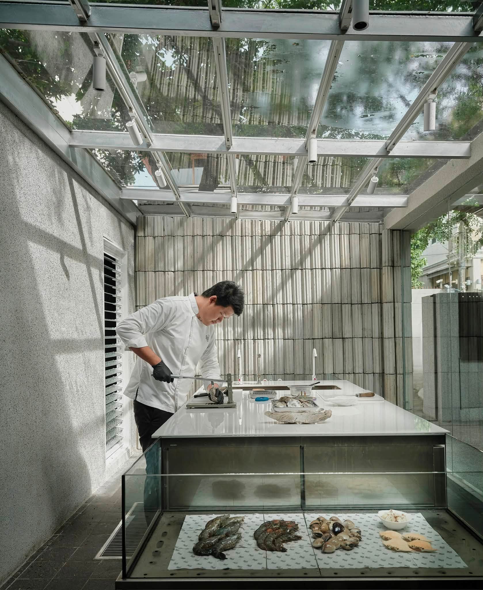 Chef at the prep station, Bangkok kitchen