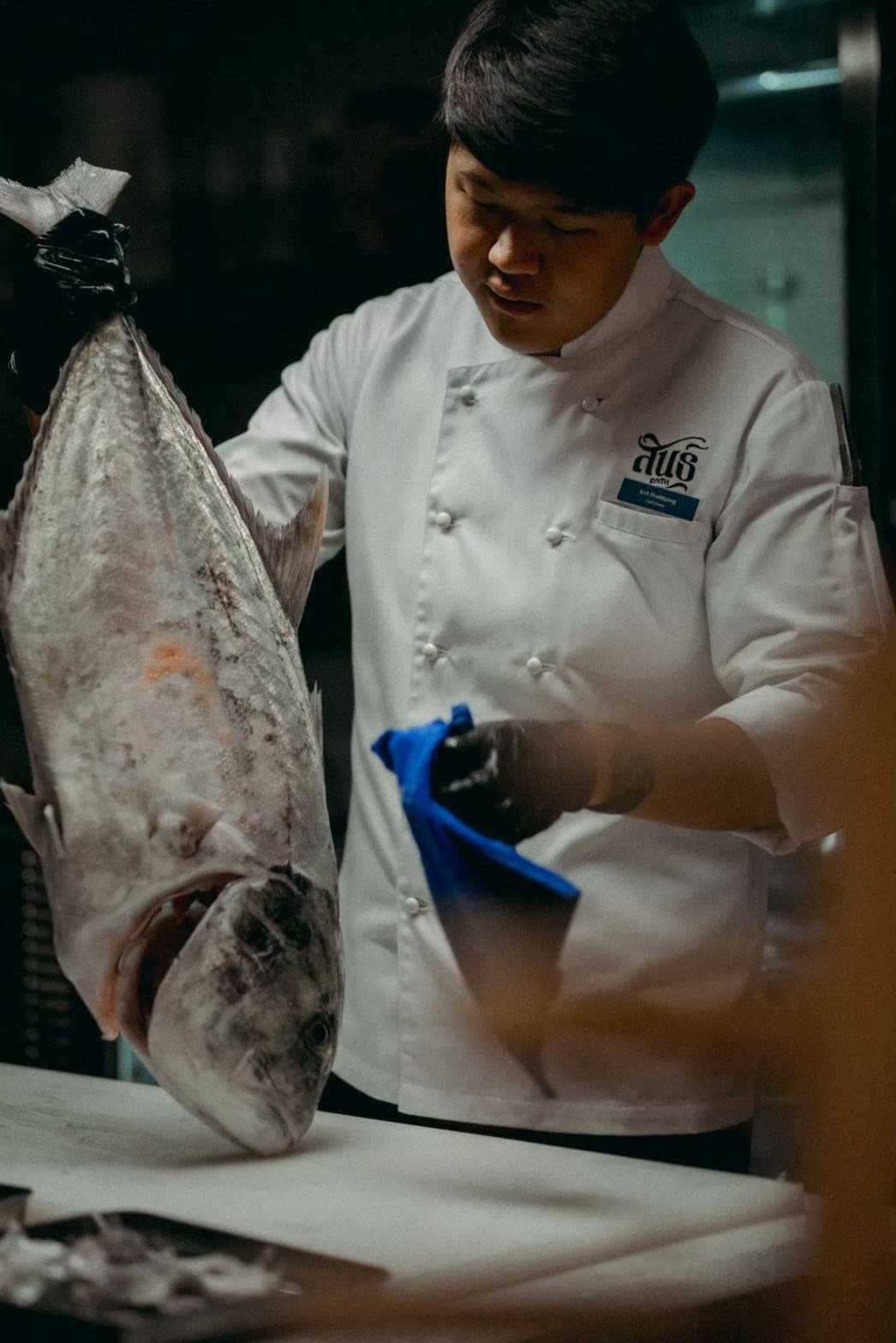 Chef with Gulf of Thailand fish